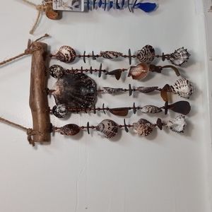 Gorgeous Seashell, Seaglass windchime with a one of a kind center seashell.